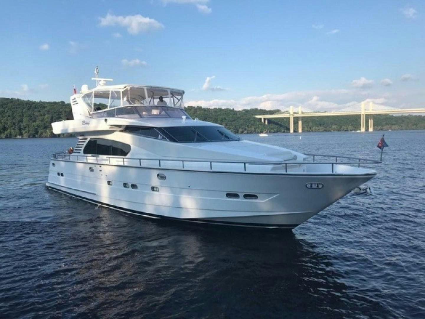 a white yacht in the water aboard BALOZI Yacht for Sale