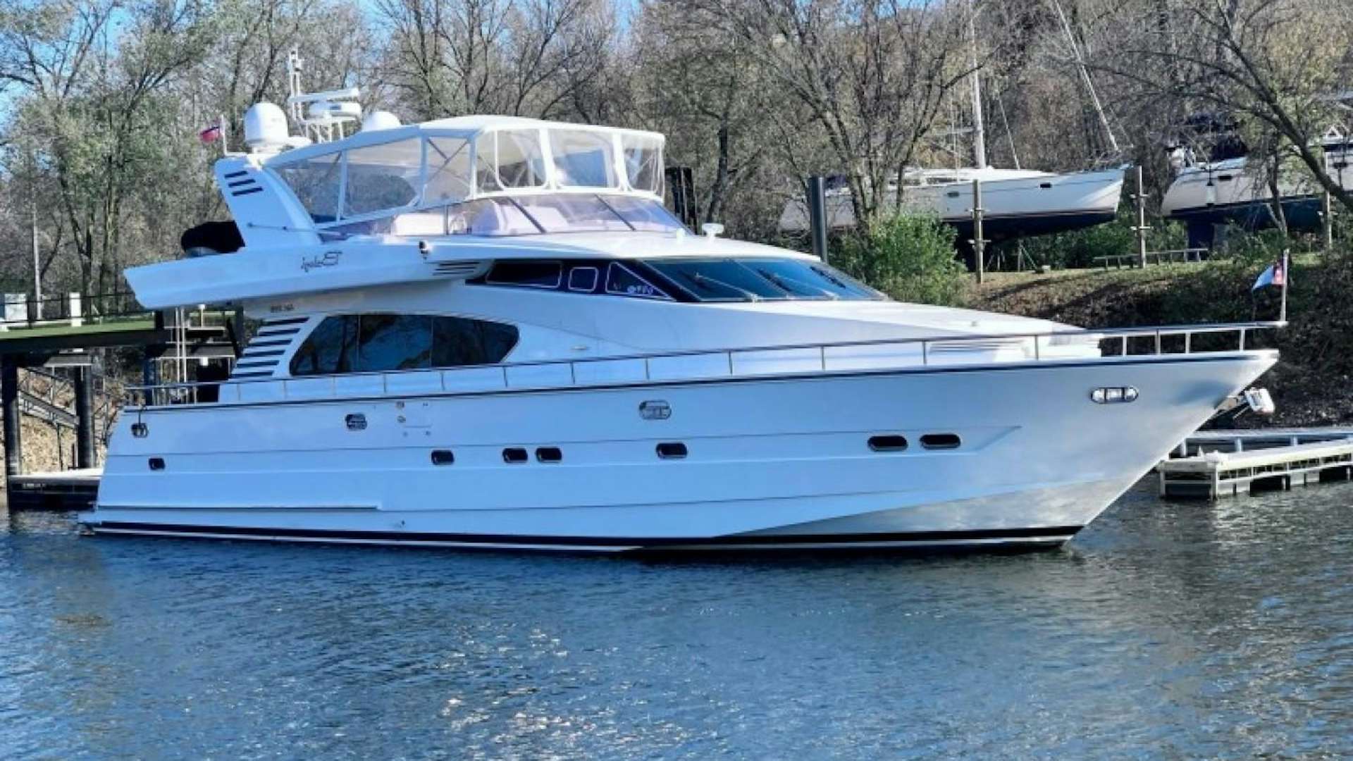 a boat docked at a pier aboard BALOZI Yacht for Sale