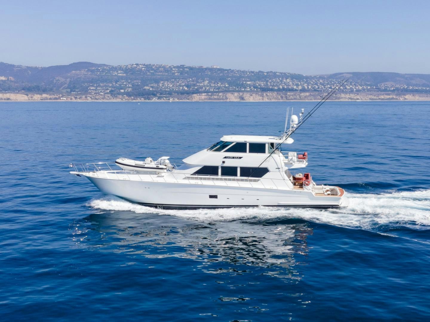 a white boat on the water aboard FELINA Yacht for Sale