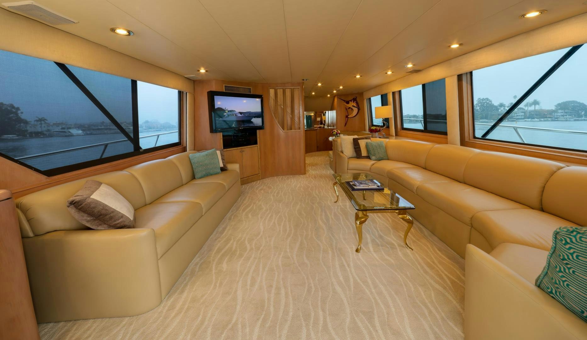 a living room with a large window aboard FELINA Yacht for Sale
