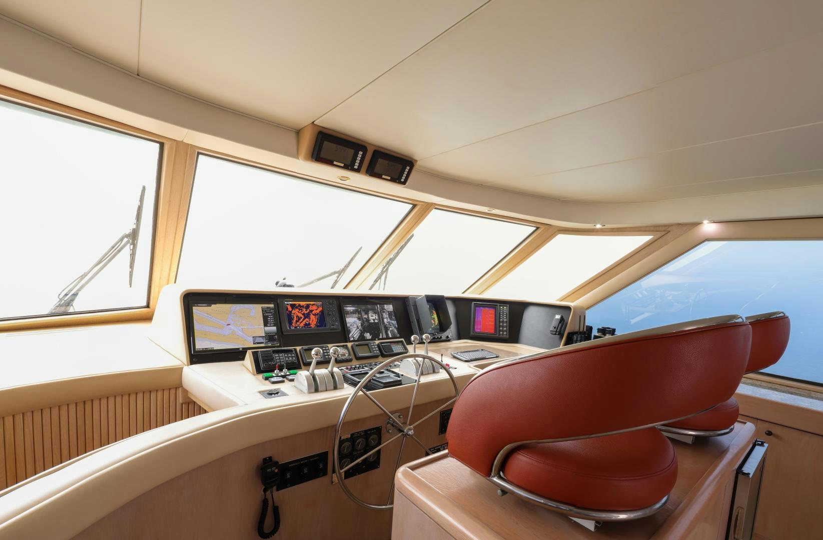 a room with a desk and chairs aboard FELINA Yacht for Sale