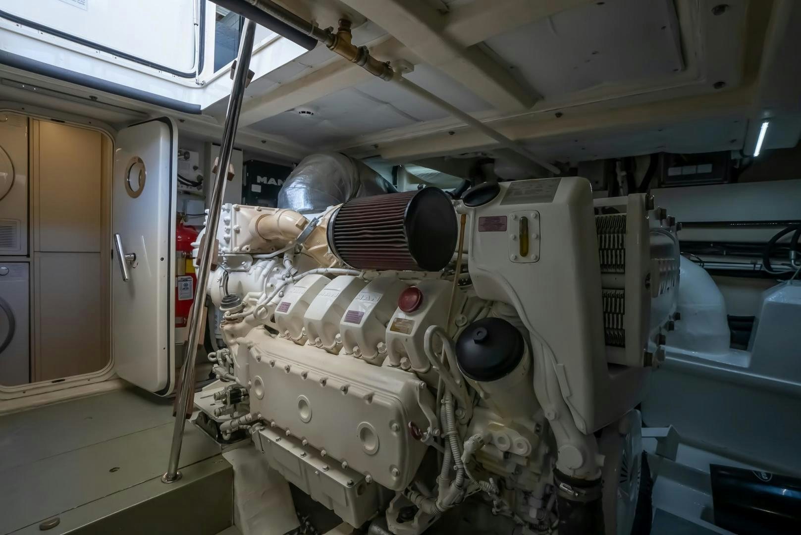 a large machine in a room aboard LEGEND Yacht for Sale