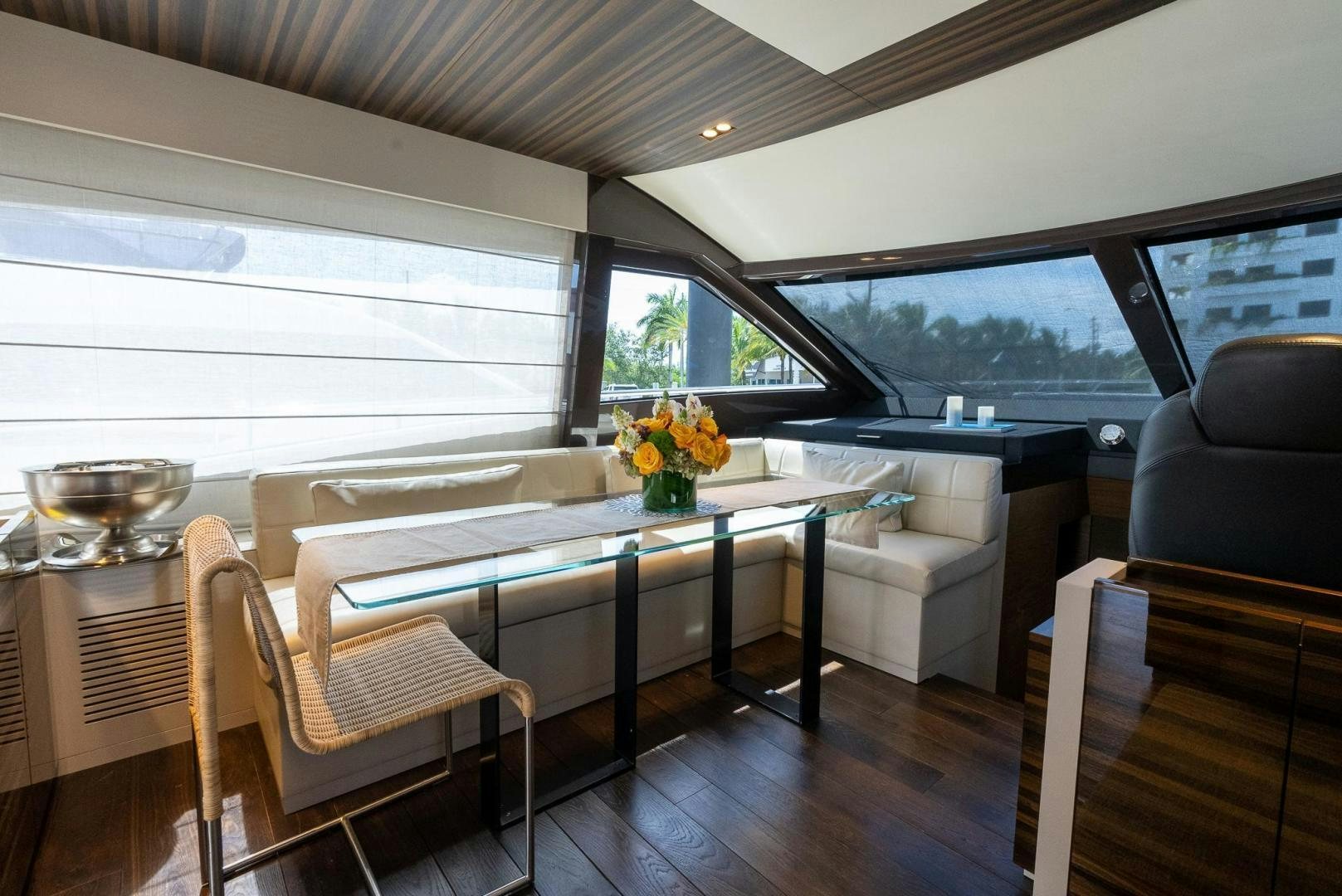a table and chairs in a room aboard LEGEND Yacht for Sale