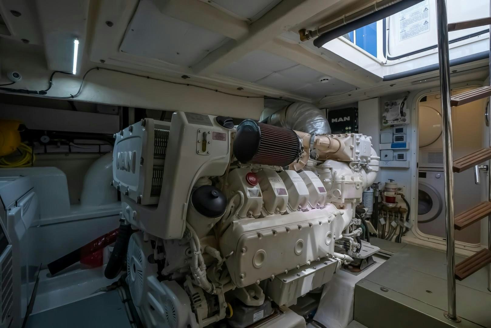 a machine in a room aboard LEGEND Yacht for Sale