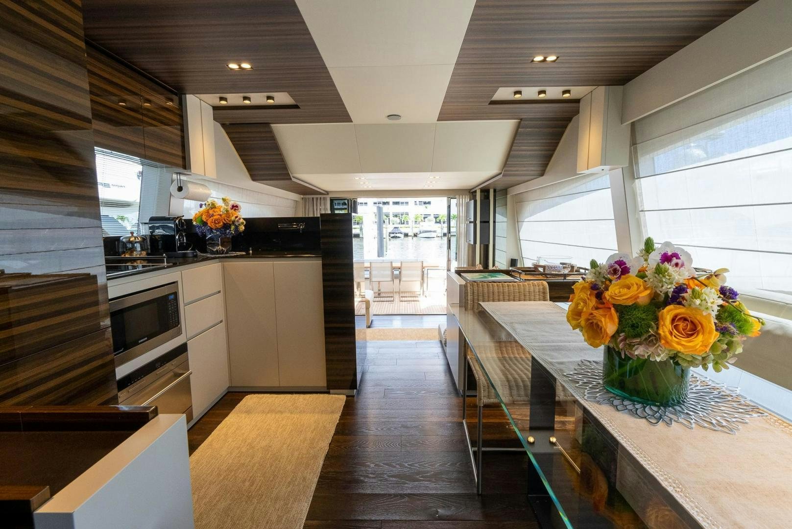 a kitchen with a large island aboard LEGEND Yacht for Sale