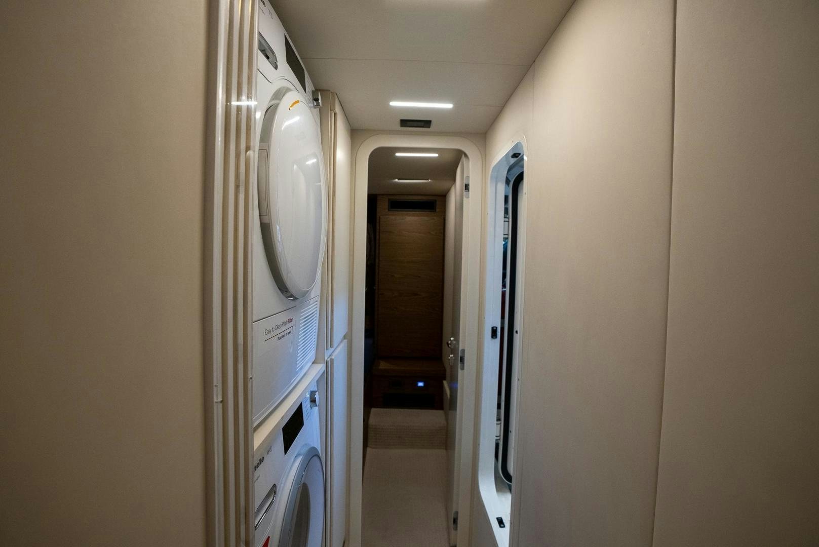 a hallway with doors aboard LEGEND Yacht for Sale
