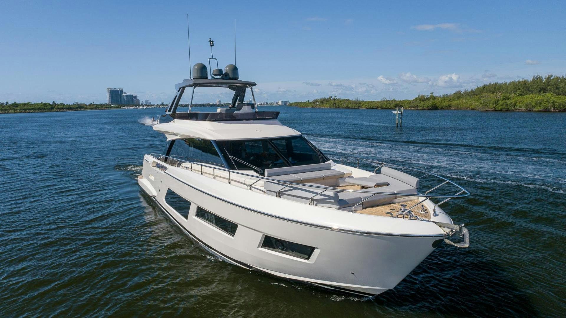 a white yacht on the water aboard LEGEND Yacht for Sale