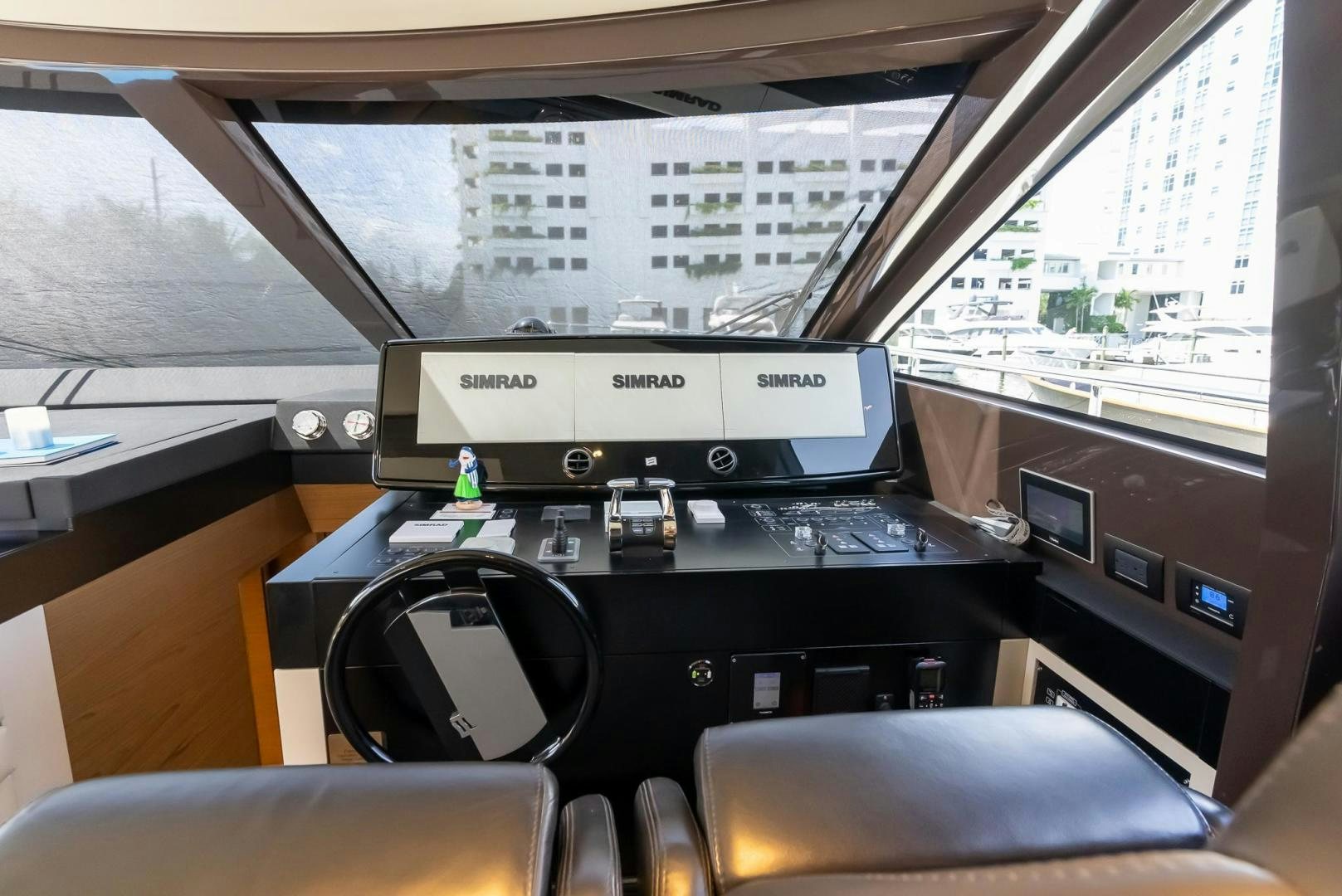 a computer on a desk aboard LEGEND Yacht for Sale