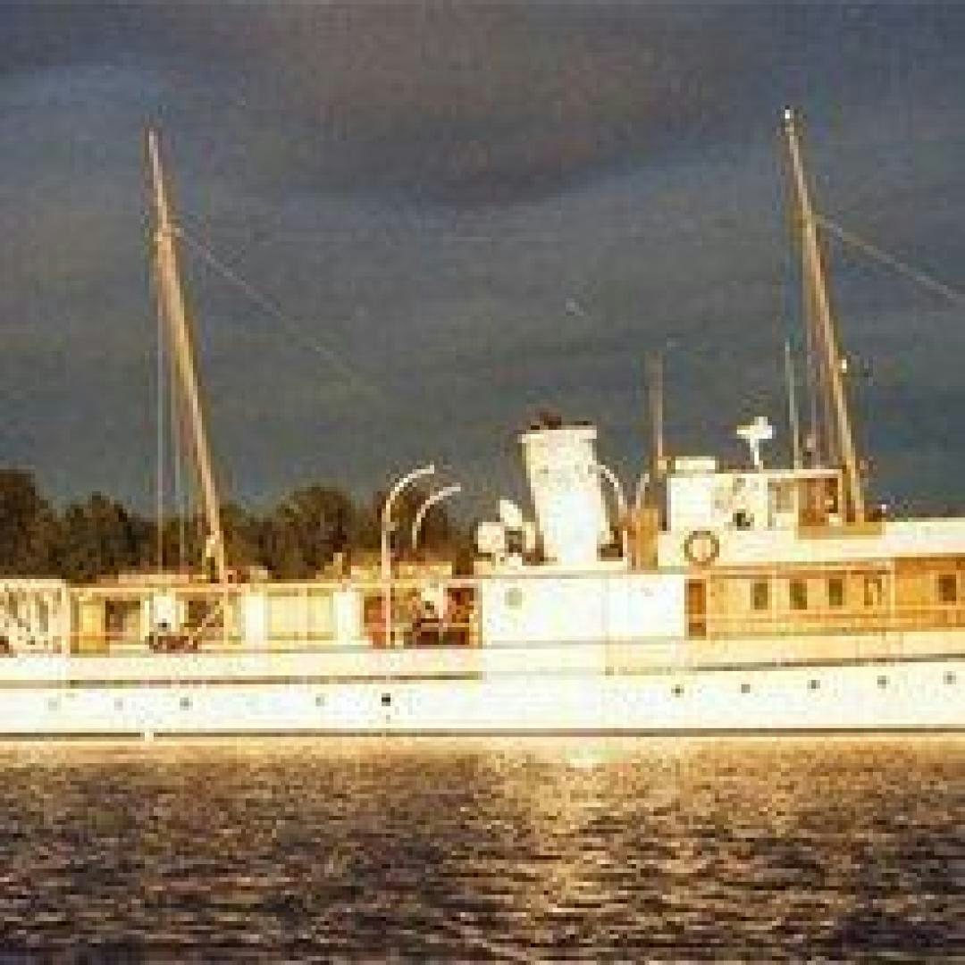 a large ship in the water aboard EL PRIMERO Yacht for Sale