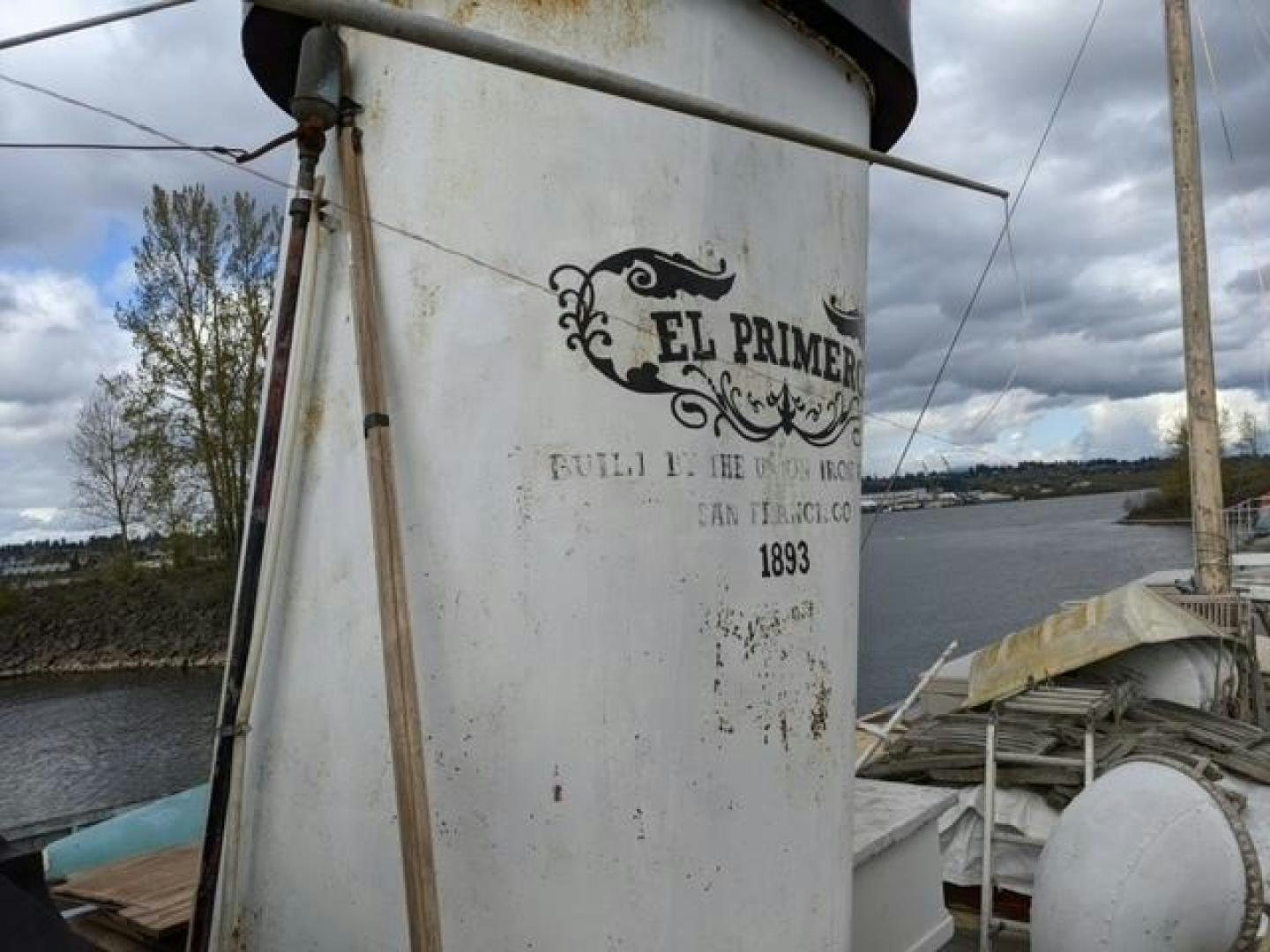 a white boat with graffiti on it aboard EL PRIMERO Yacht for Sale