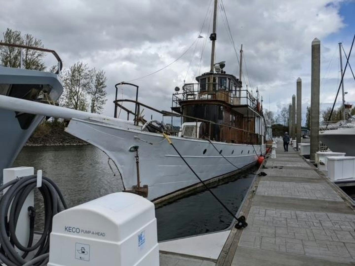 a boat tied to a dock aboard EL PRIMERO Yacht for Sale