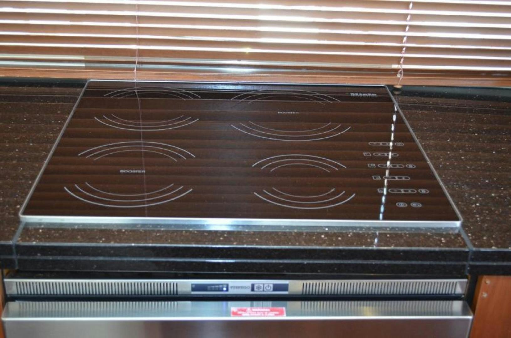 a black rectangular object with a black surface and a black background aboard PEARL Yacht for Sale