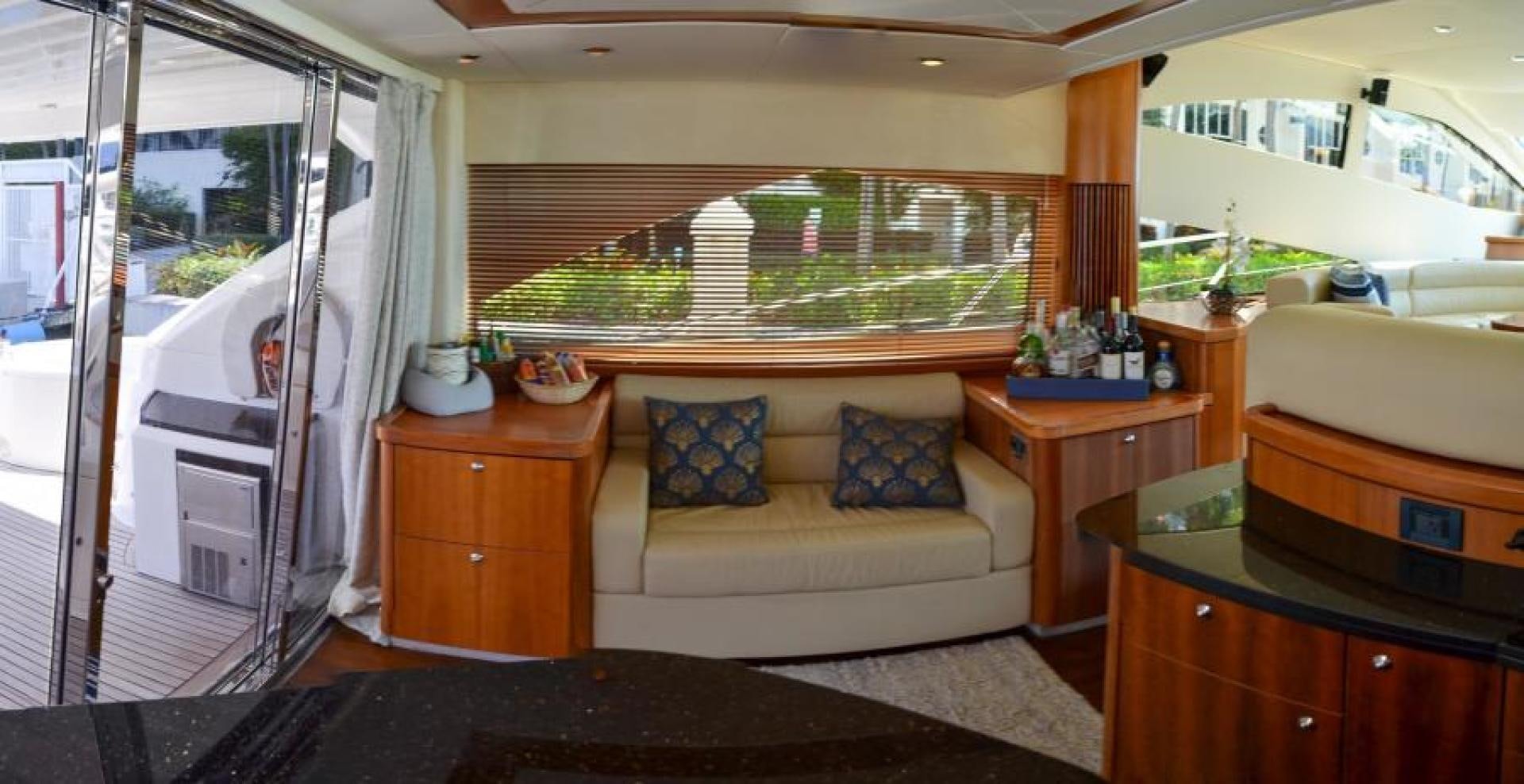 a room with a bed and a desk aboard PEARL Yacht for Sale