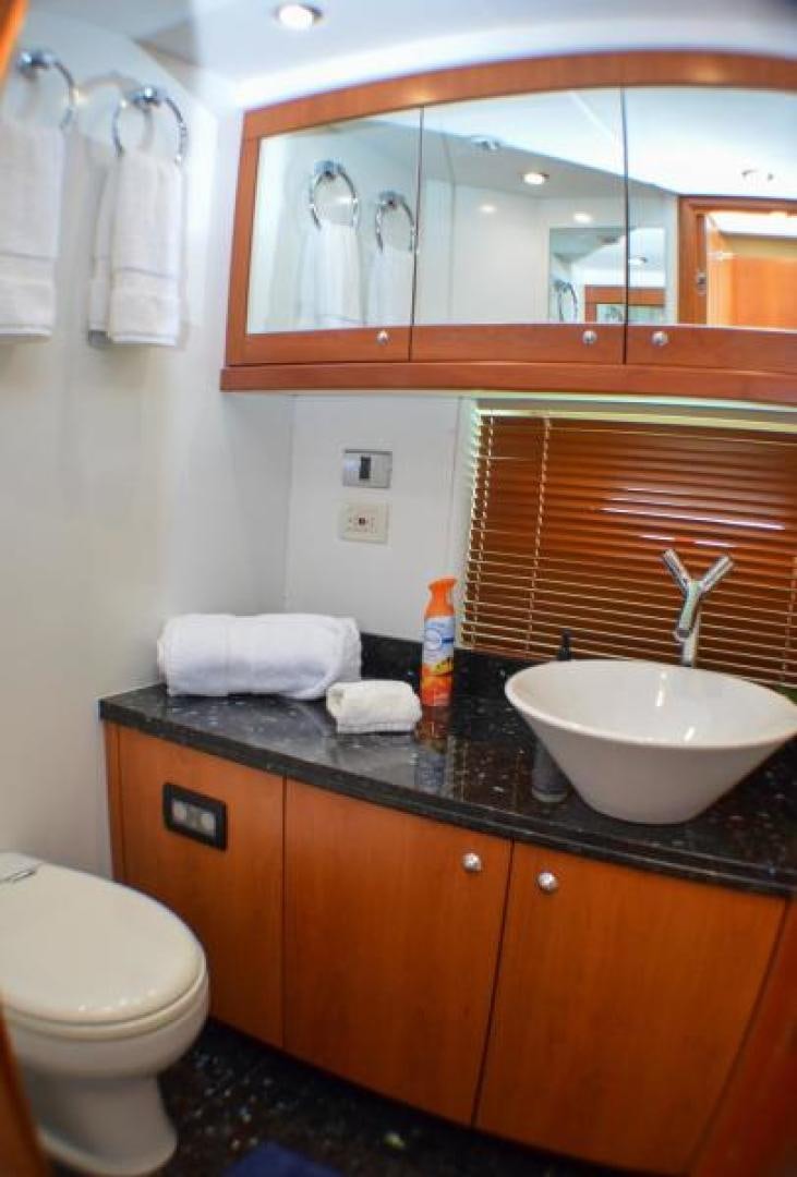 a bathroom with a sink and a toilet aboard PEARL Yacht for Sale