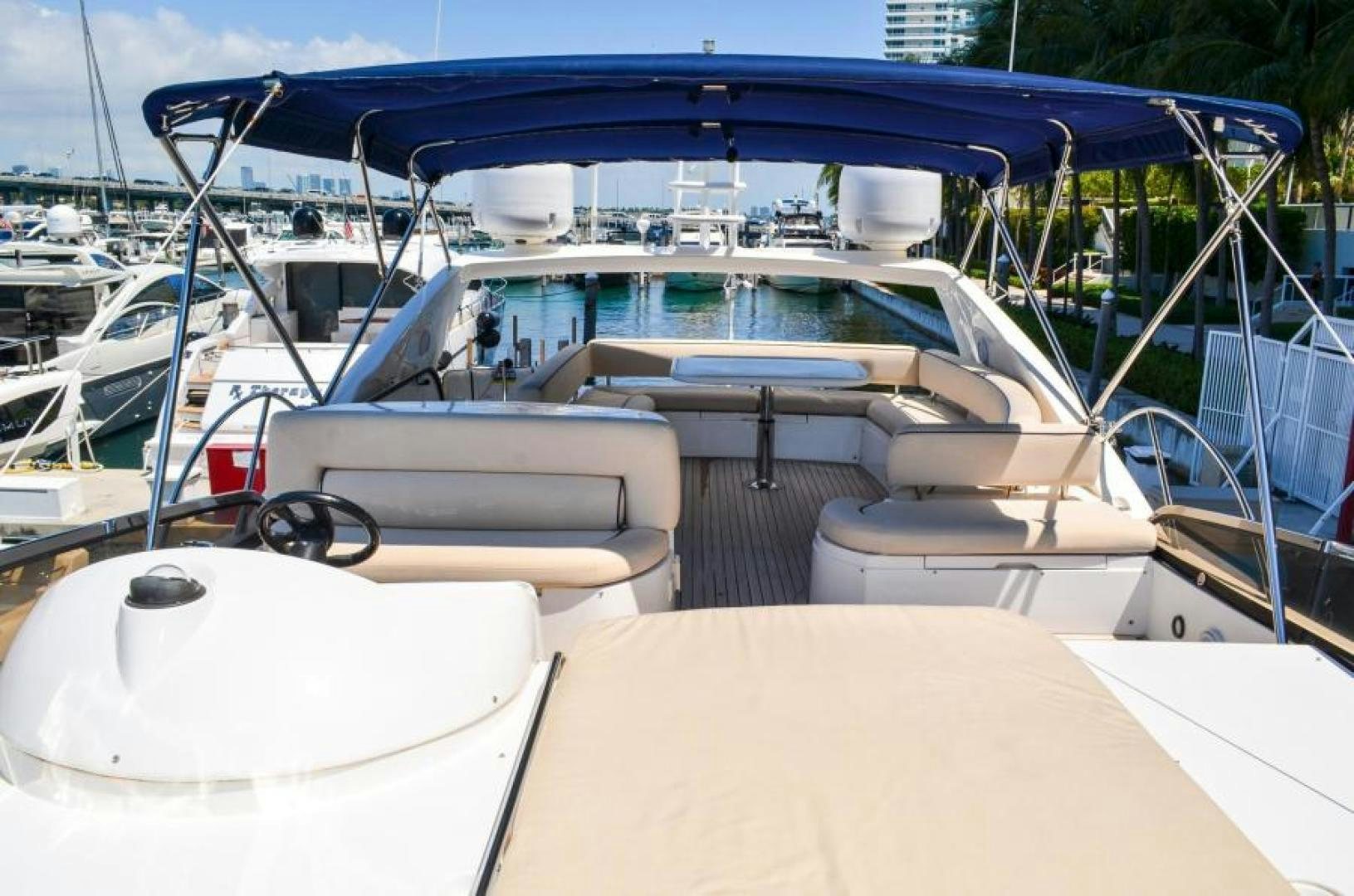 a boat with a table and chairs aboard PEARL Yacht for Sale