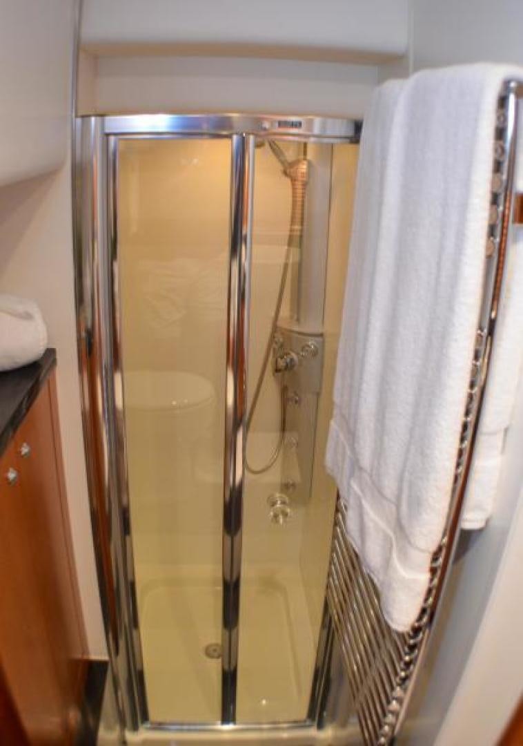 a shower unit with a glass door aboard PEARL Yacht for Sale