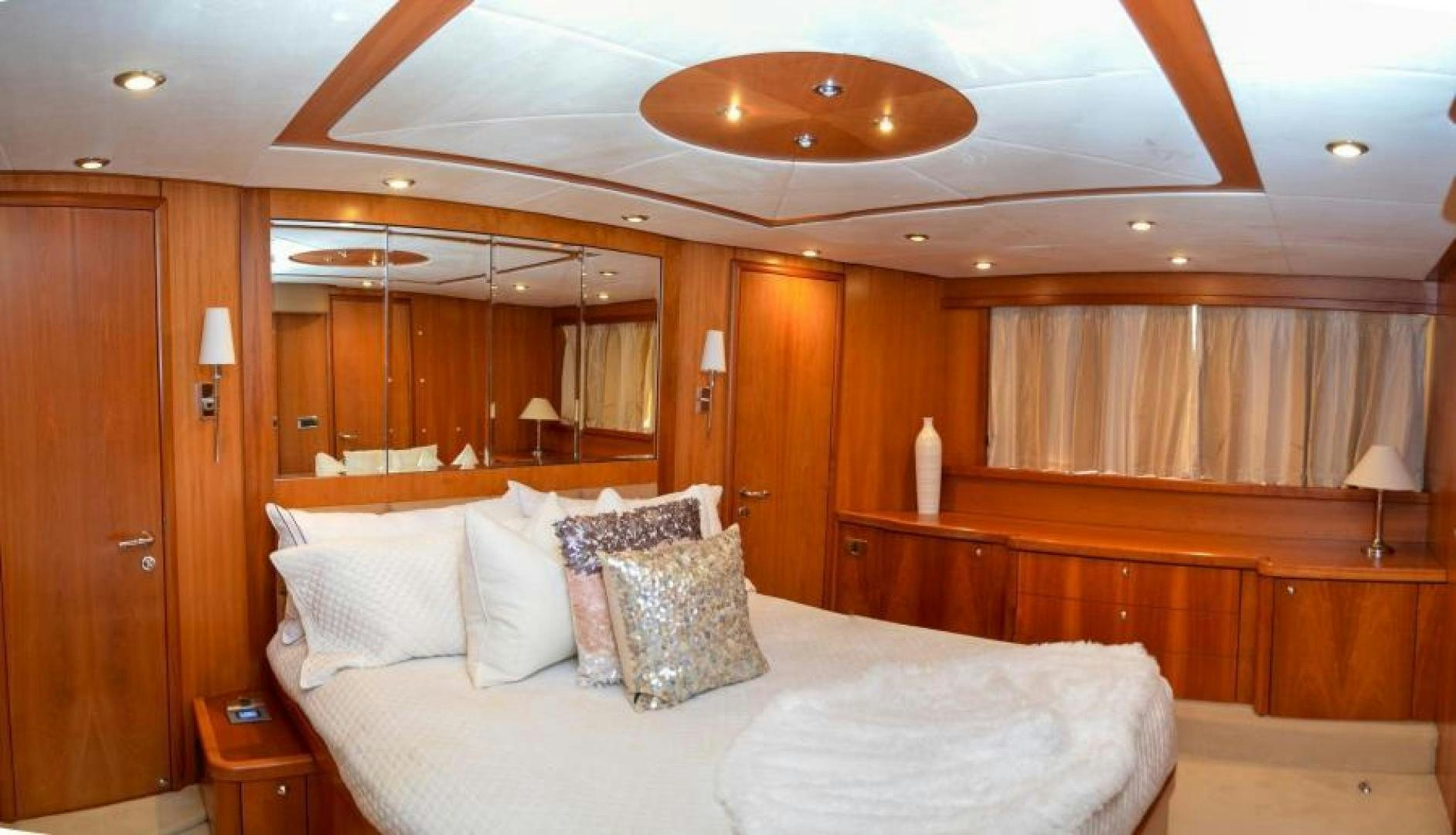 a bed in a room aboard PEARL Yacht for Sale