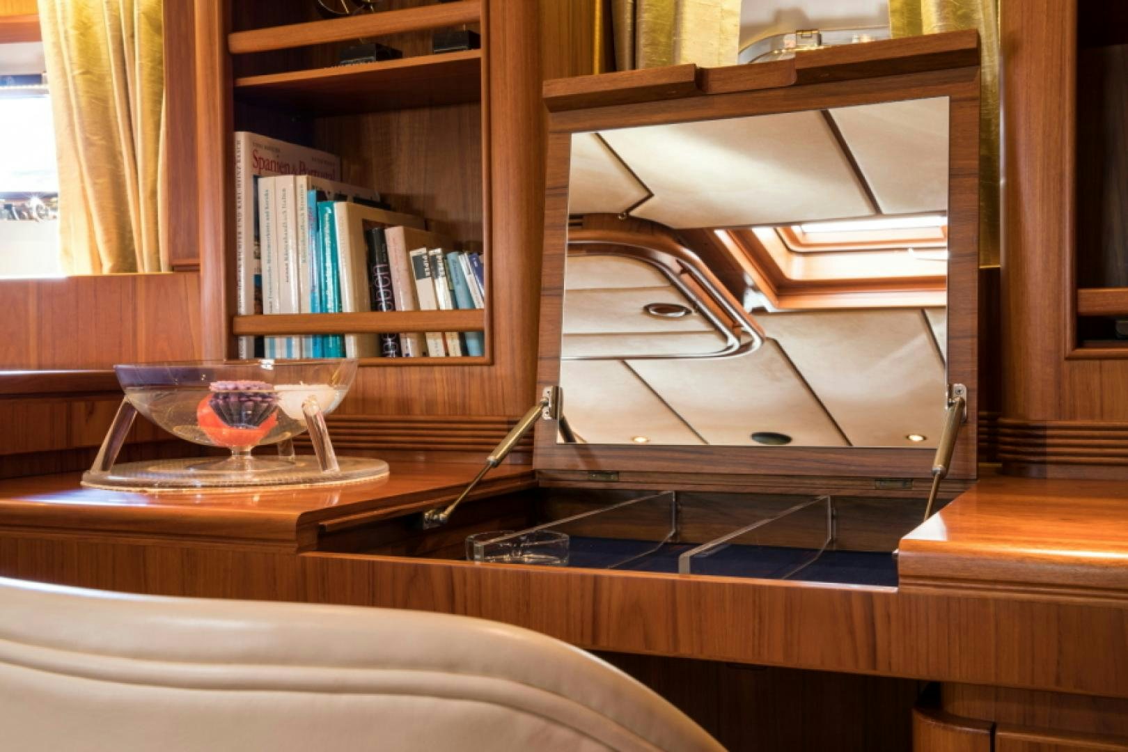 a glass of water on a table aboard FIDELITAS Yacht for Sale