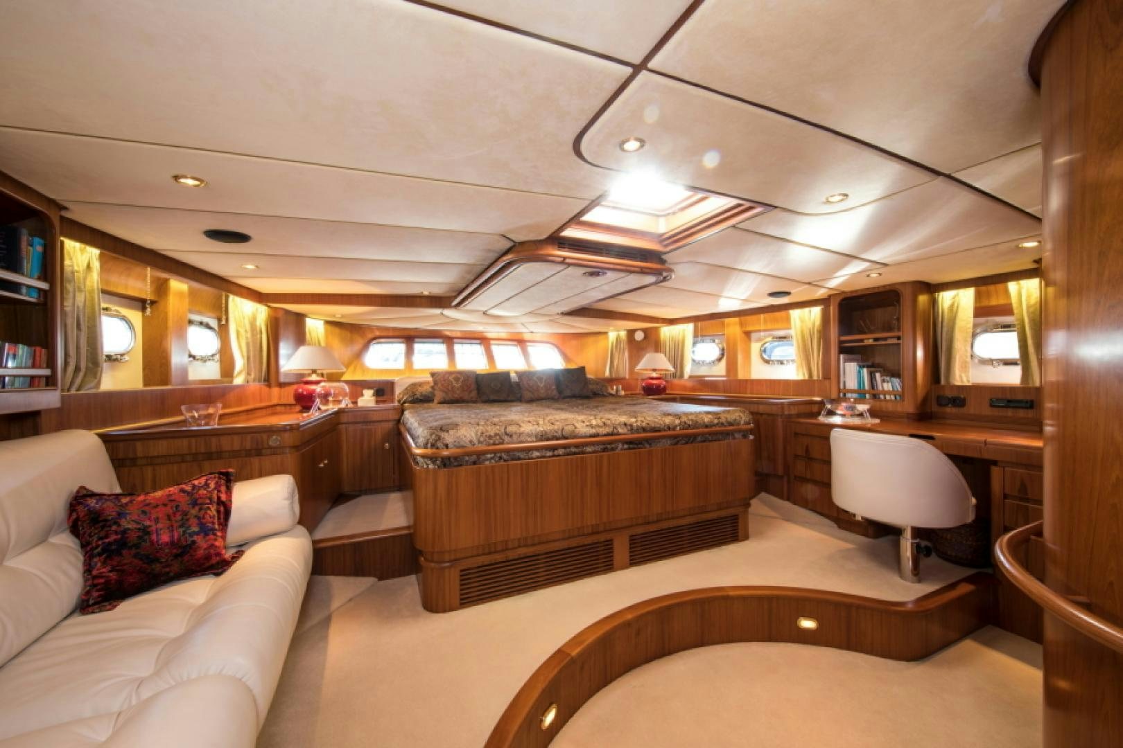 a room with a couch and a table aboard FIDELITAS Yacht for Sale
