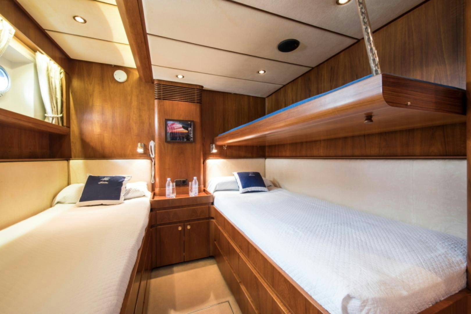 a room with two beds aboard FIDELITAS Yacht for Sale