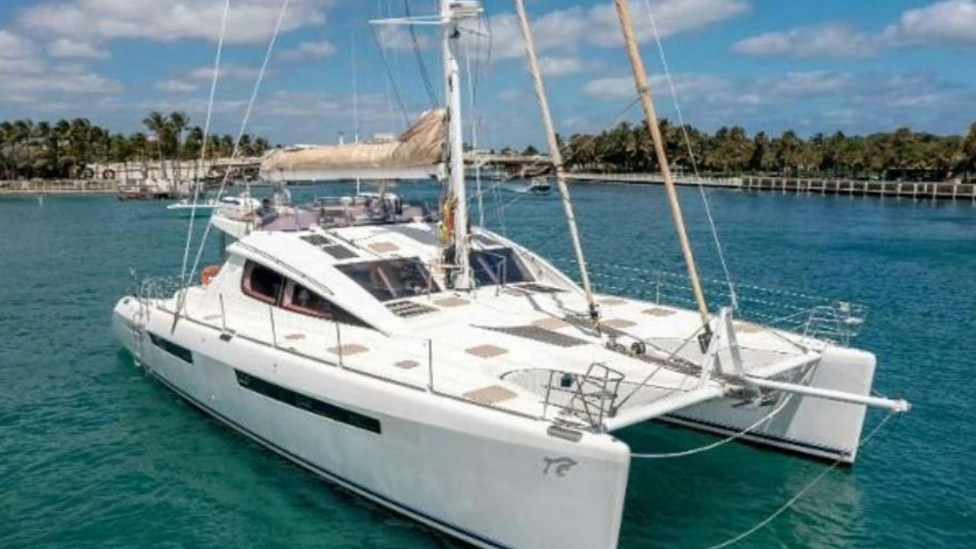 a white boat in the water aboard ELIXIR Yacht for Sale