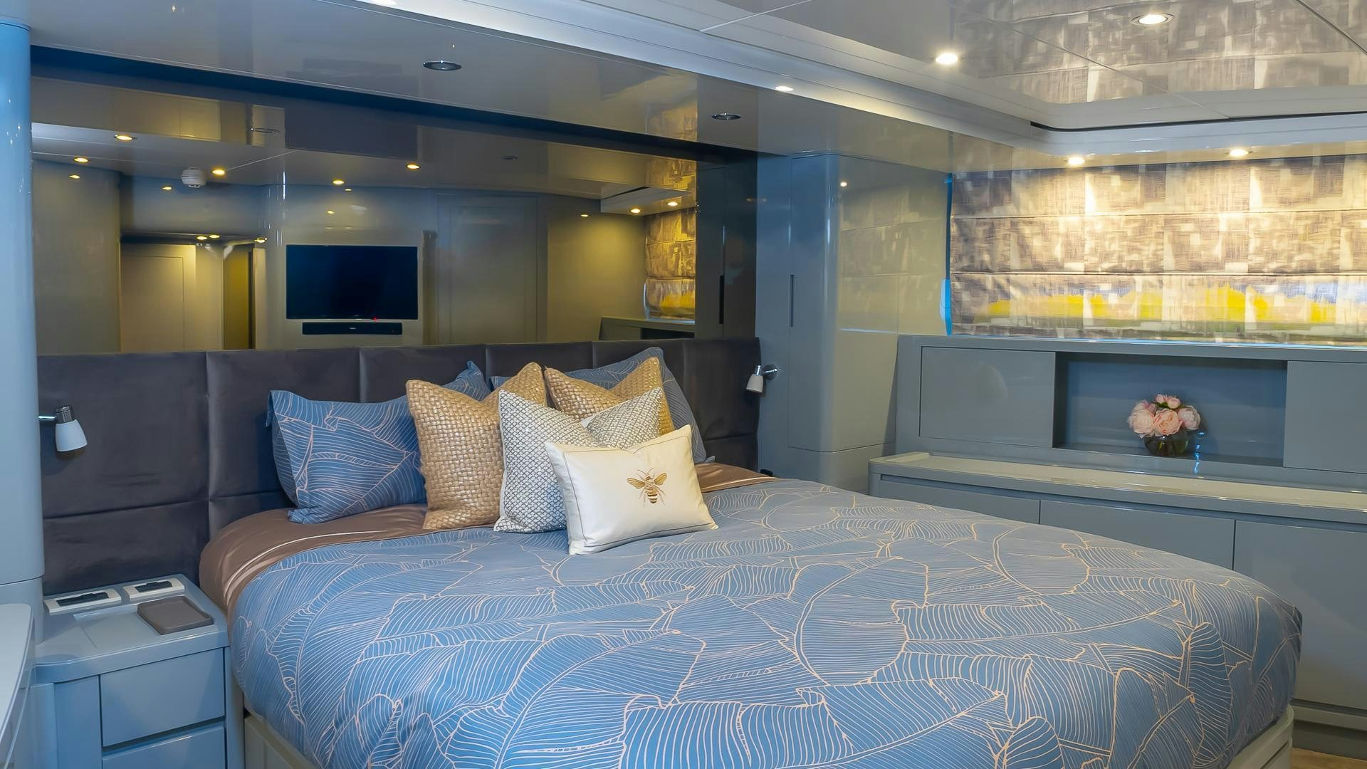 a bed with pillows aboard BAD ROMANCE IV Yacht for Sale