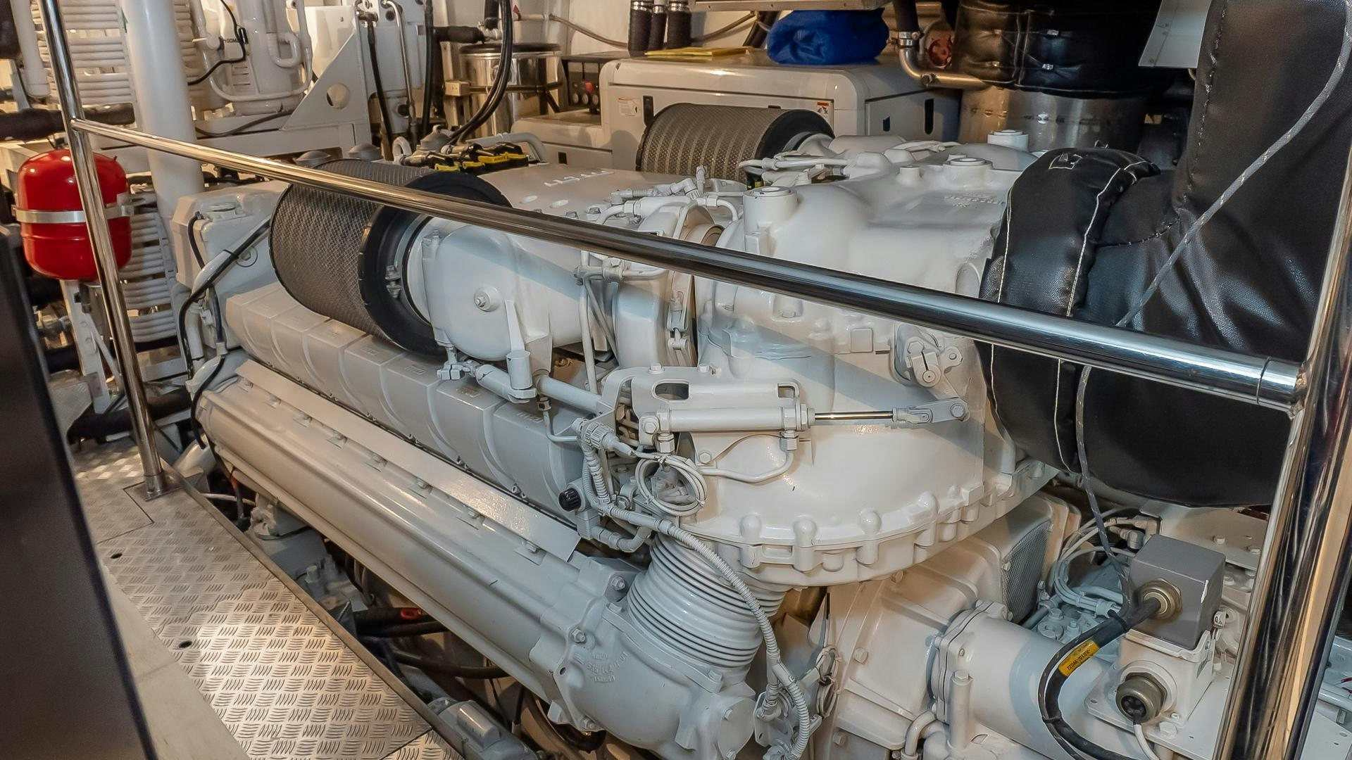 a large machine with a large metal pipe aboard BAD ROMANCE IV Yacht for Sale