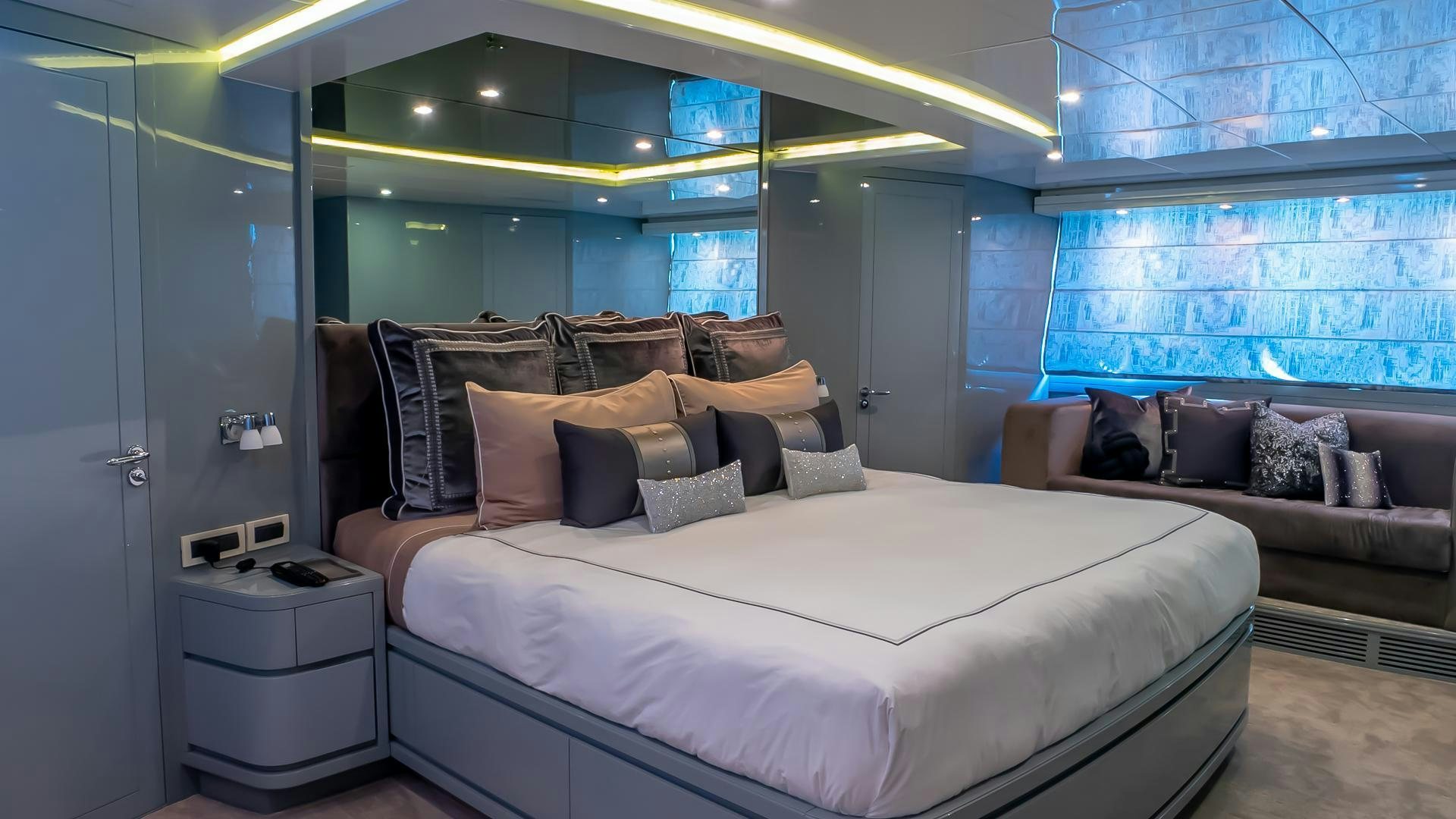 a bed in a room aboard BAD ROMANCE IV Yacht for Sale
