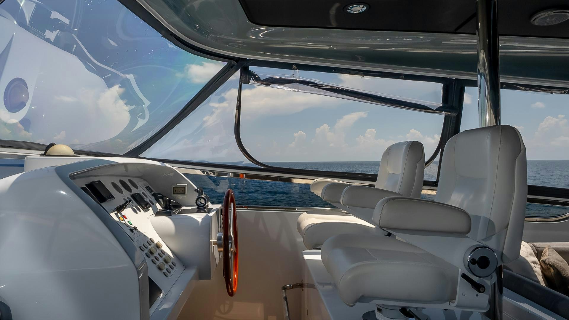 the inside of a car aboard BAD ROMANCE IV Yacht for Sale