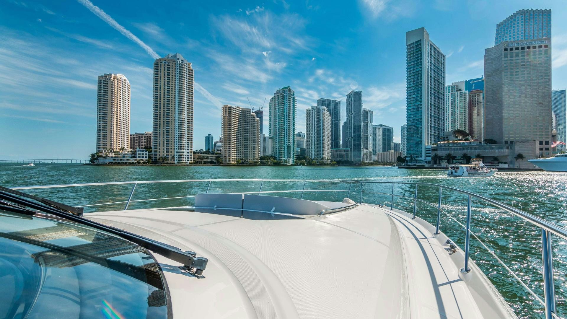 a body of water with buildings in the background aboard XANADU Yacht for Sale