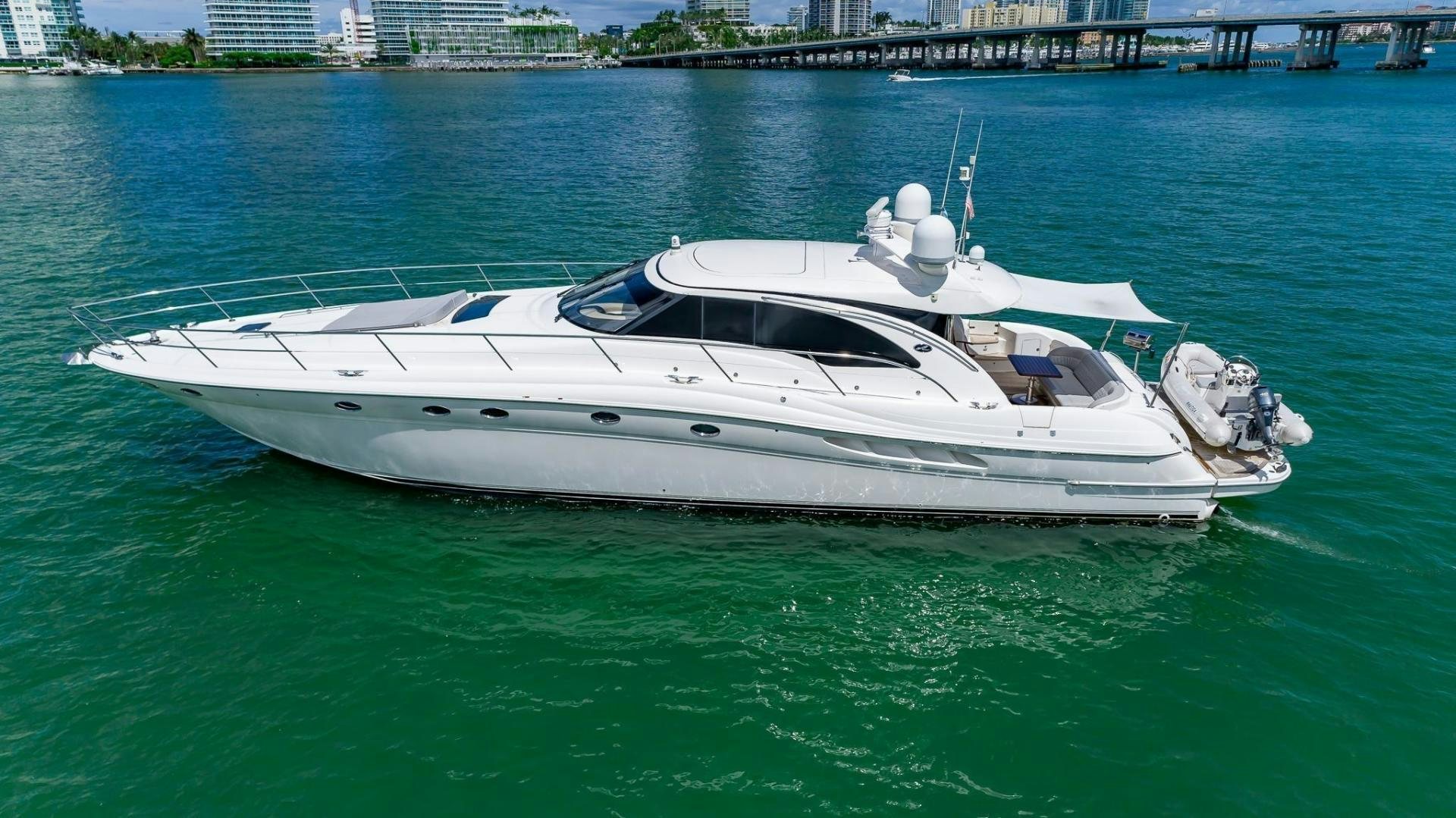 a white boat on the water aboard XANADU Yacht for Sale