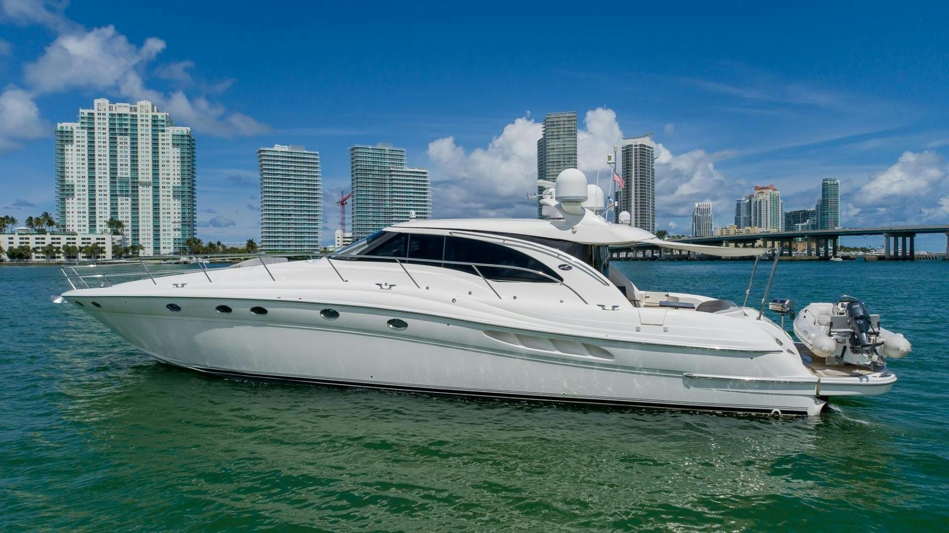 a white yacht in the water aboard XANADU Yacht for Sale