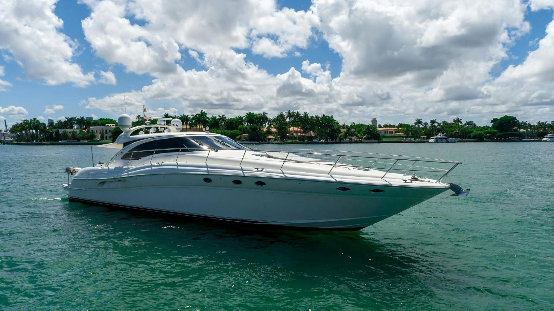 a white boat in the water aboard XANADU Yacht for Sale