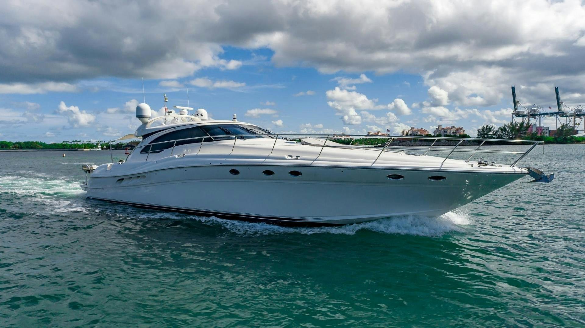 a white boat in the water aboard XANADU Yacht for Sale