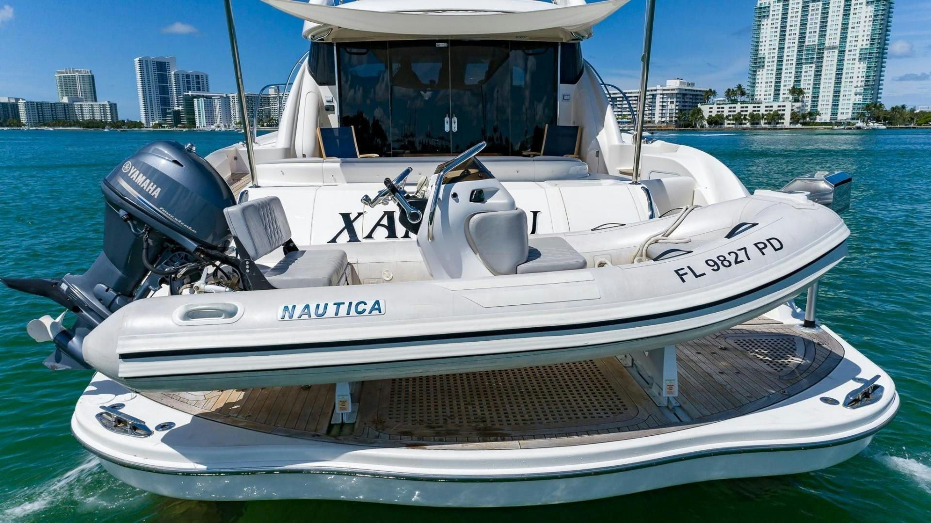 a white boat on the water aboard XANADU Yacht for Sale