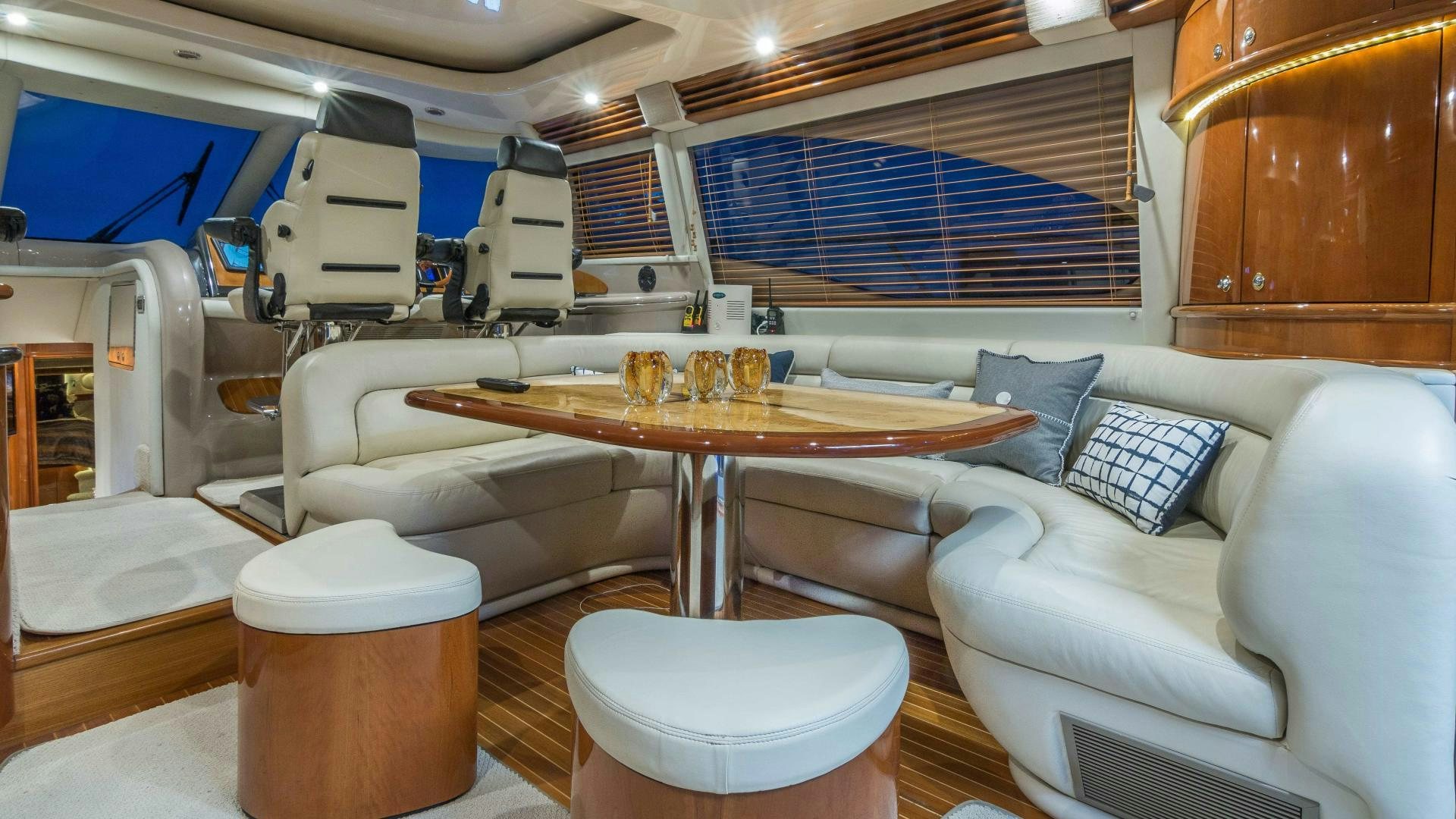 a room with a table and chairs aboard XANADU Yacht for Sale