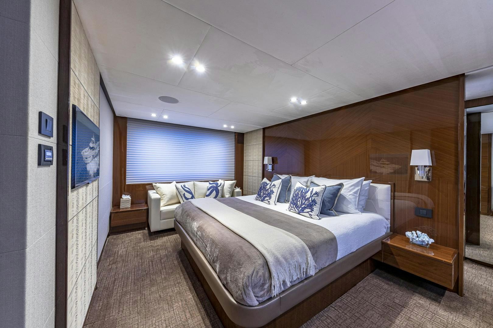 a bedroom with two beds aboard GOOD LIFE Yacht for Sale