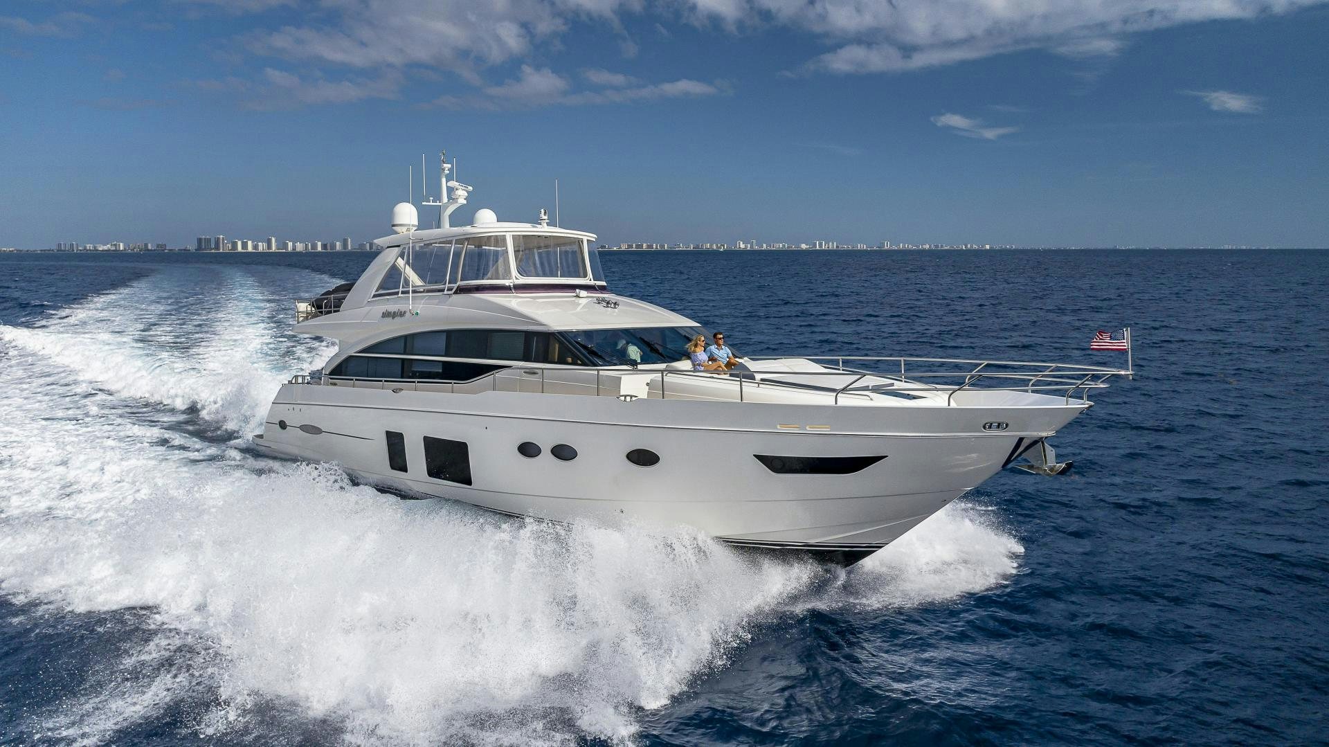 a white boat on the water aboard GOOD LIFE Yacht for Sale