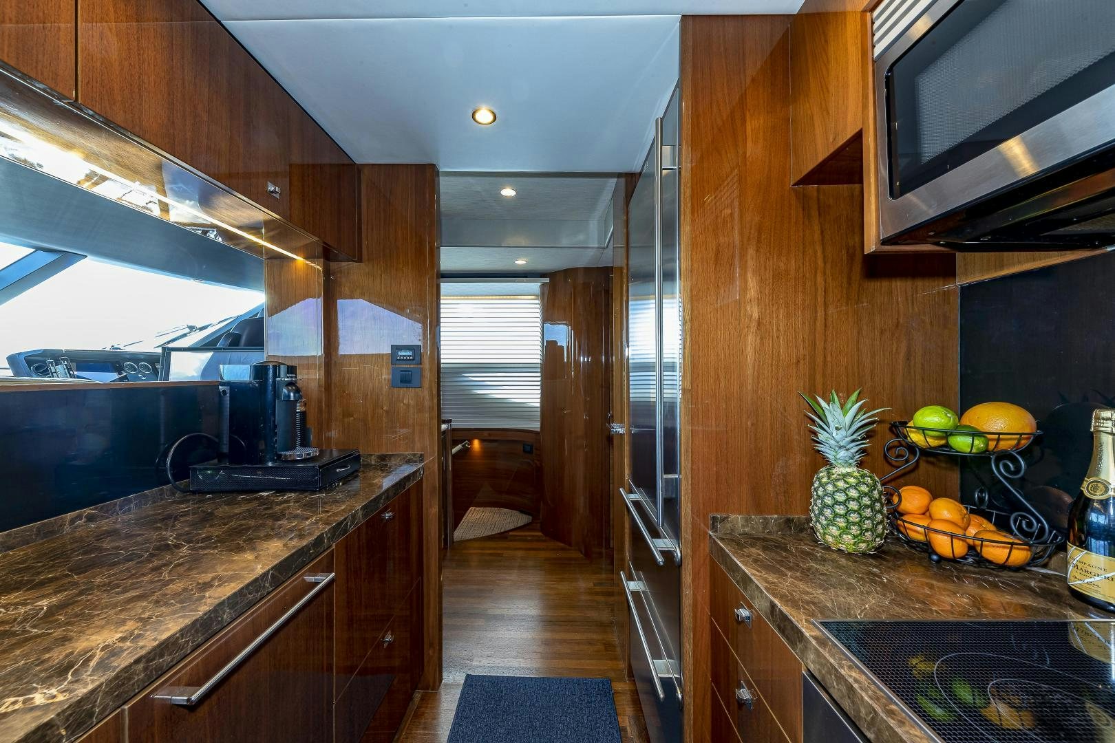 a kitchen with a large island aboard GOOD LIFE Yacht for Sale