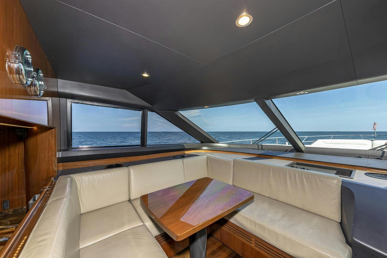 a boat with a table and a bench aboard GOOD LIFE Yacht for Sale