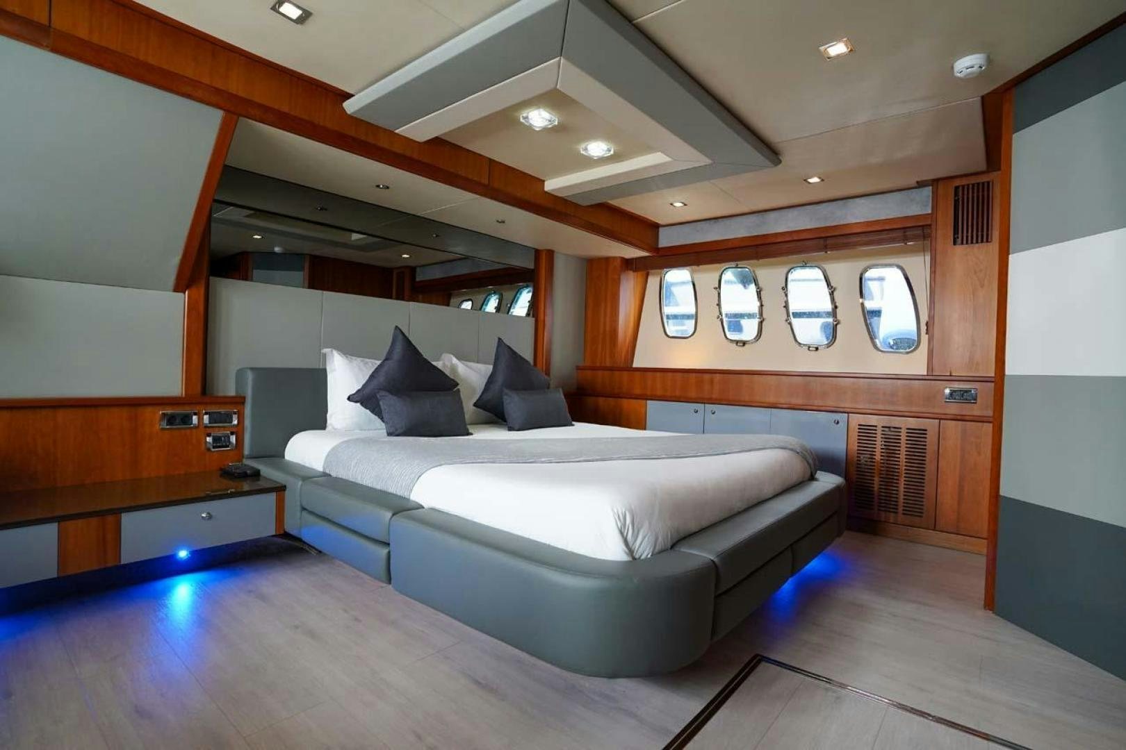 a bed in a room aboard LI-JOR Yacht for Sale