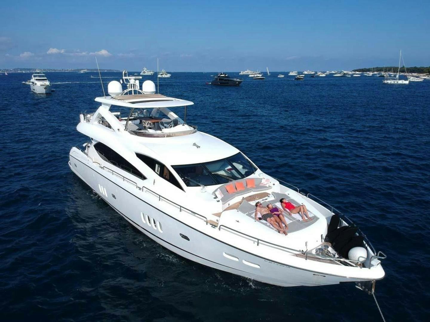 a white boat in the water aboard LI-JOR Yacht for Sale