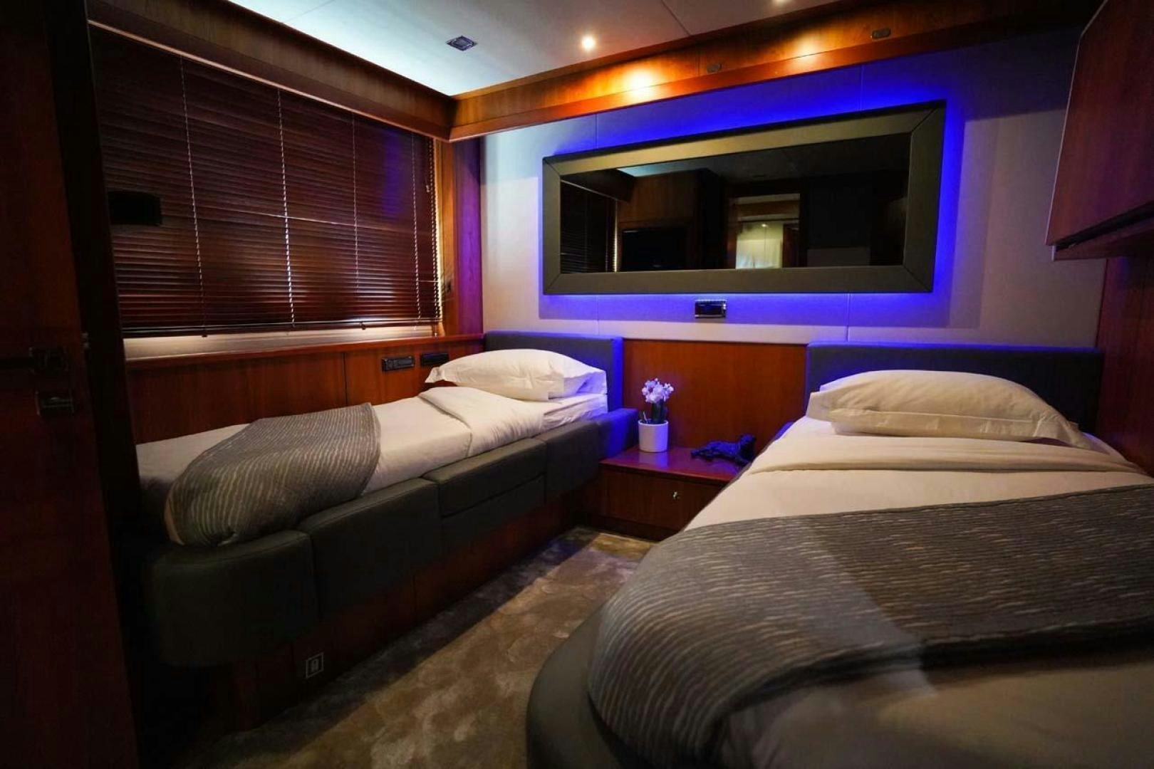 a room with two beds aboard LI-JOR Yacht for Sale