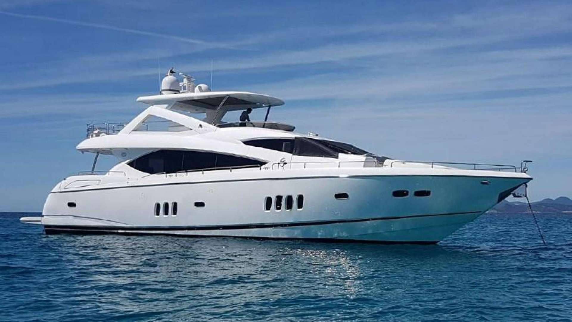 a white yacht in the water aboard LI-JOR Yacht for Sale