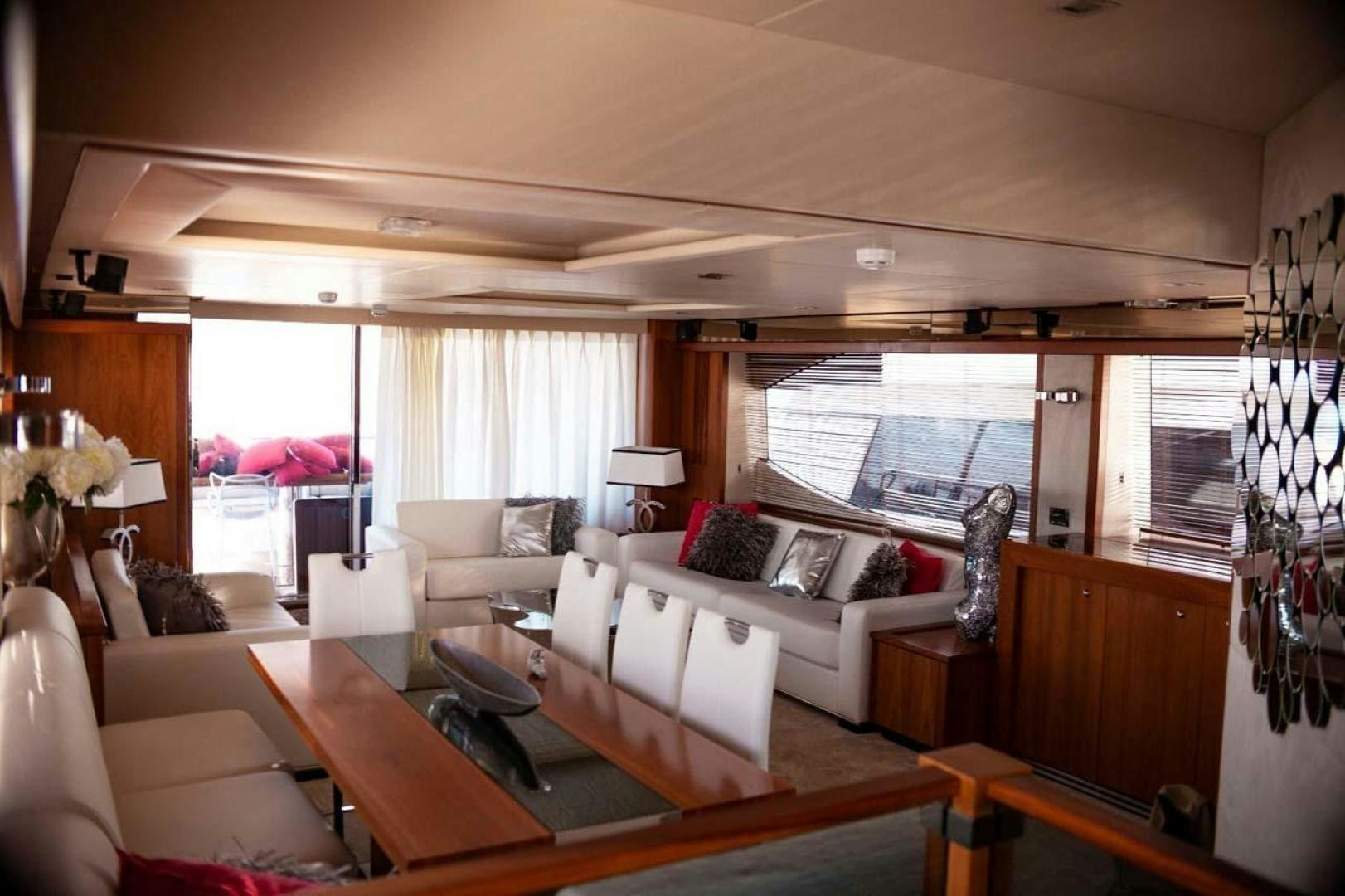 a living room with a large window aboard LI-JOR Yacht for Sale