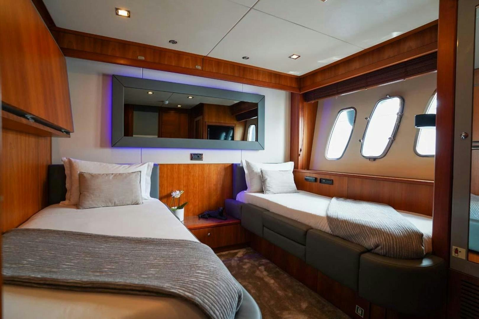 a room with two beds aboard LI-JOR Yacht for Sale