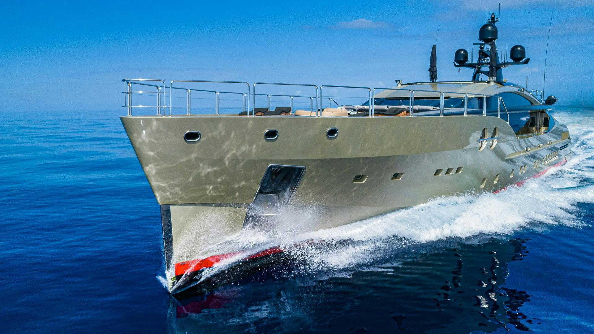 a large white boat on the water aboard DB9 Yacht for Sale