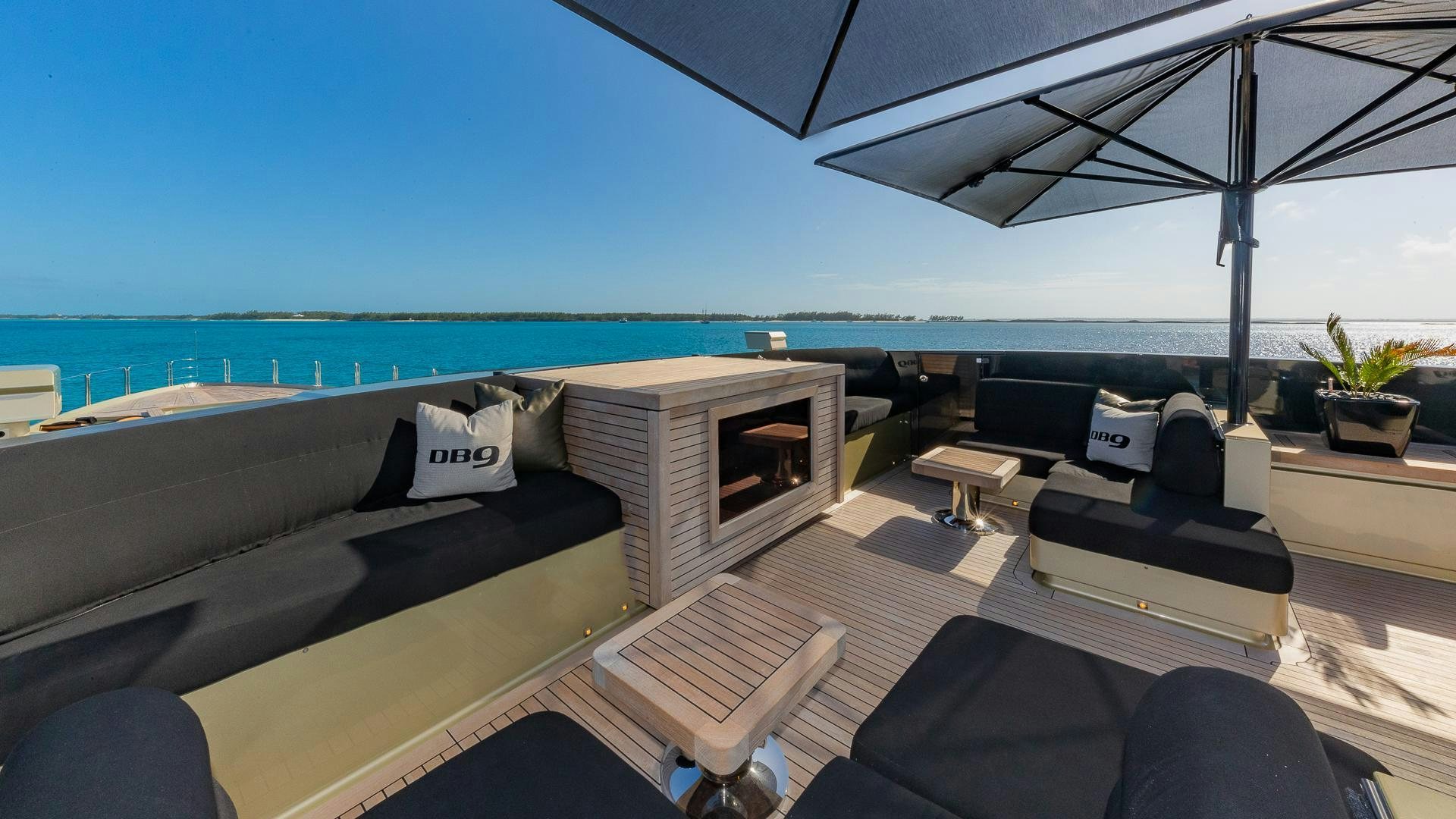 a room with a couch and a tv on the floor aboard DB9 Yacht for Sale