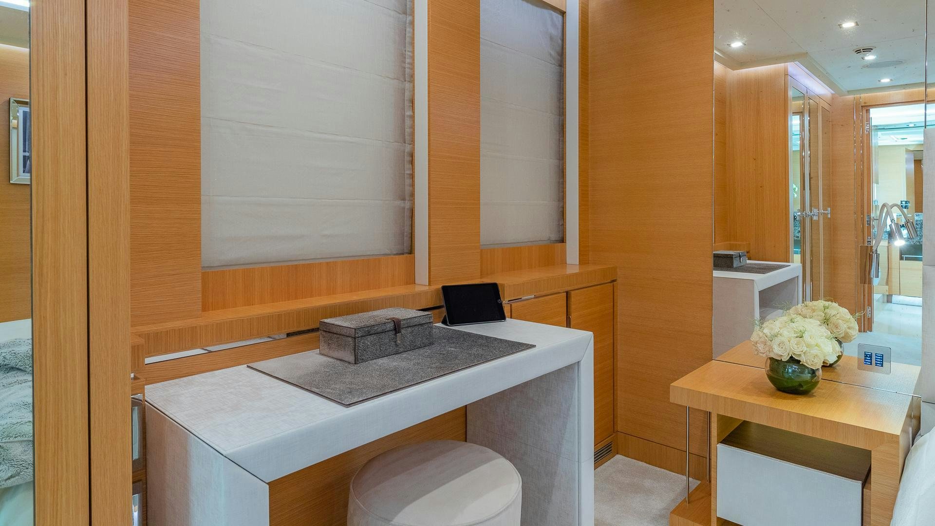 a room with a desk and a laptop aboard DB9 Yacht for Sale