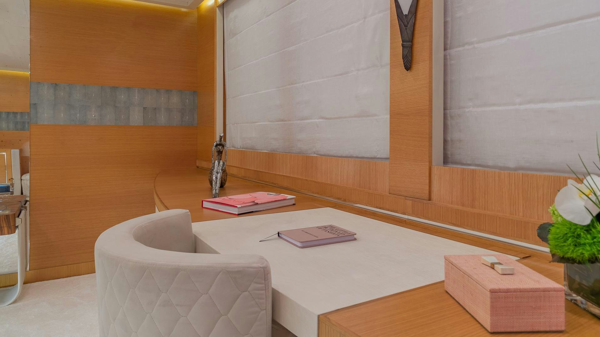 a room with a table and chairs aboard DB9 Yacht for Sale